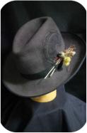 Hand felted Homburg hat, made using a bow-carder. Hand-dyed beaver fur with silk trim.